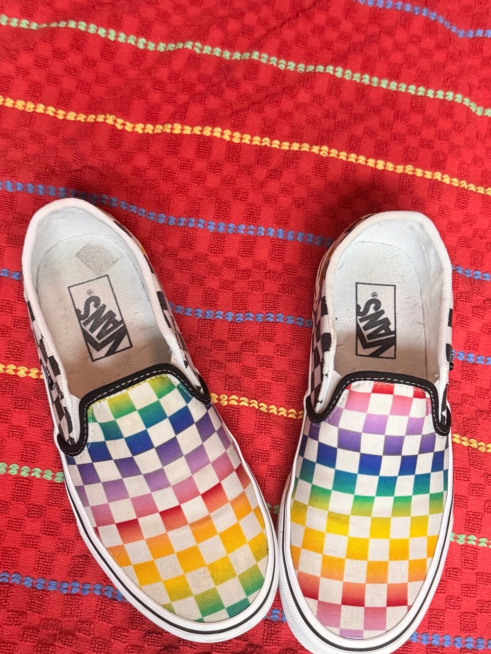 Vans women’s (or kids) Slip-On Rainbow Checkerboard Sneakers